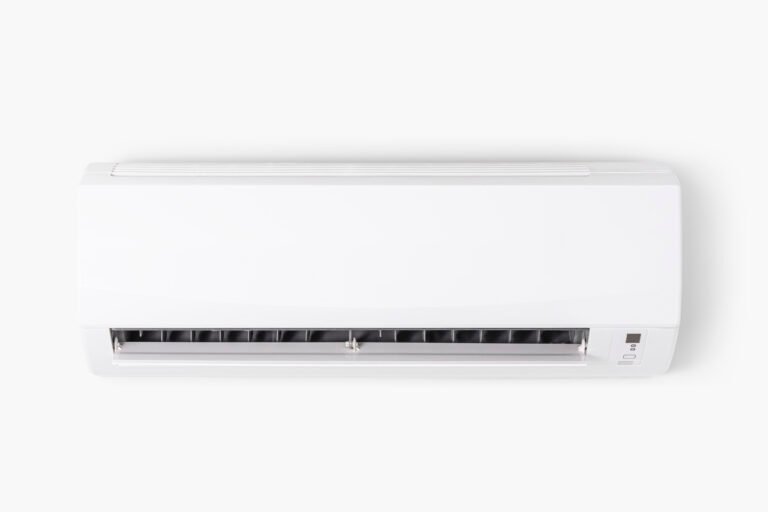 Air conditioner mounted on a white wall